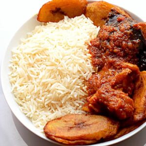 Steamed Rice Combo(With Protein Fish/Meat And Fried Plantain